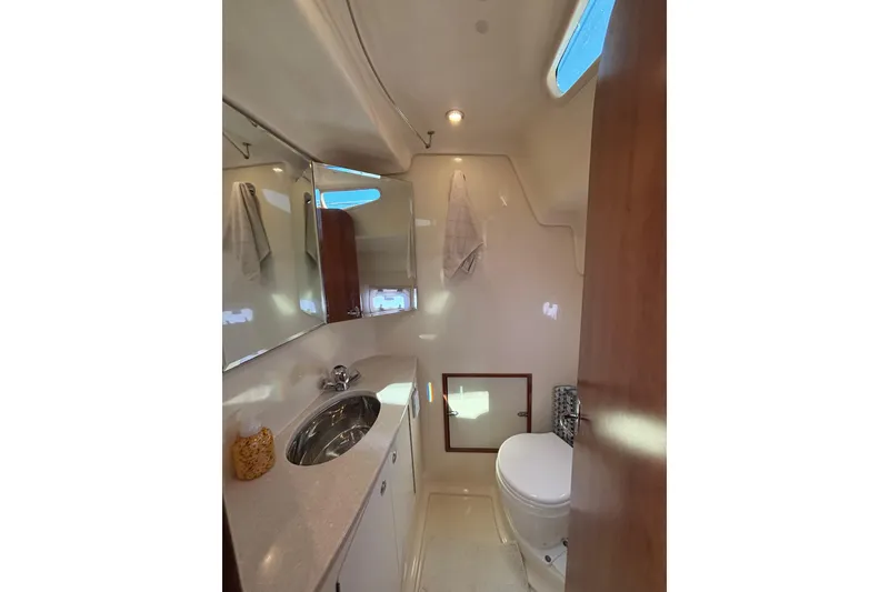 Slide: The Image of Luxurious bathroom in 2014 Gemini Legacy 35 yacht, featuring modern fixtures and ample lighting. - 15