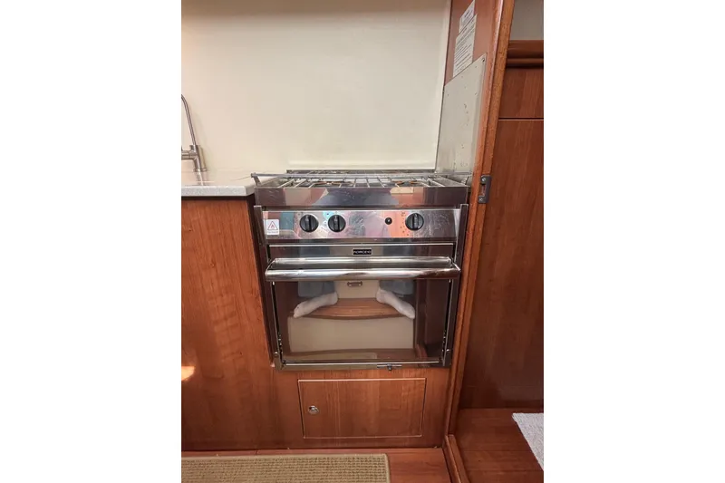 Slide: The Image of 2014 Gemini Legacy 35 yacht kitchen with stainless steel stove and oven. - 19