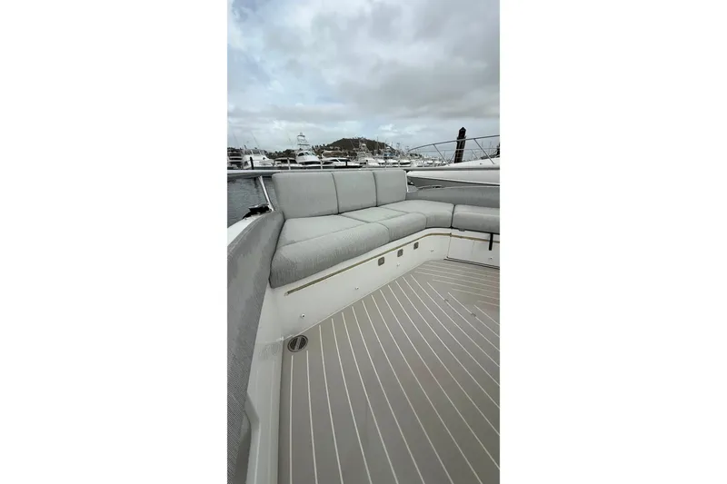 Slide: The Image of 2024 Azimut Verve 48 yacht with sleek deck and comfortable seating. - 15