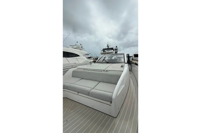 Slide: The Image of 2024 Azimut Verve 48 yacht with sleek design and luxurious deck seating. - 17