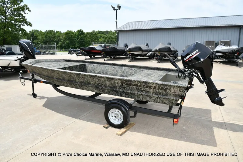 Slide: The Image of 2026 Tracker Grizzly 1648 Jon boat on trailer outdoors. - 10