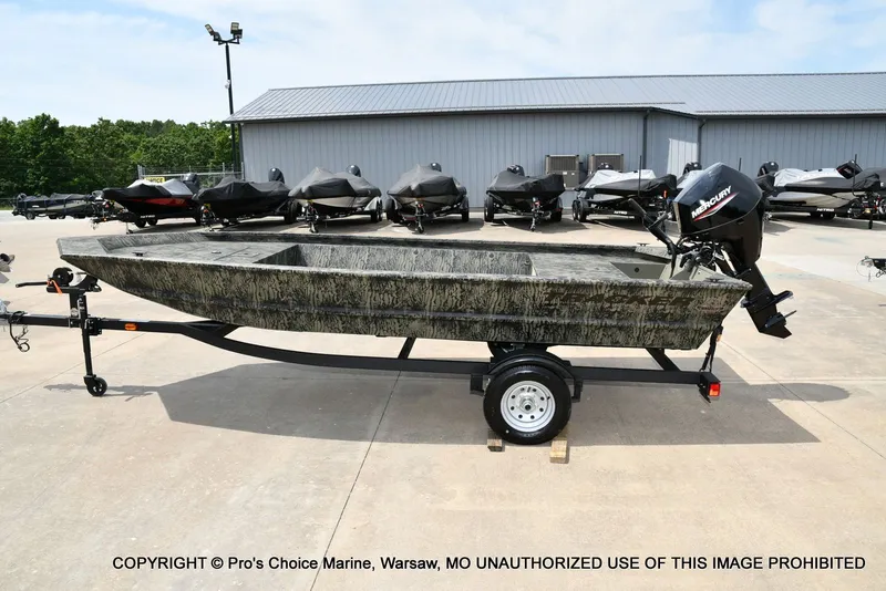 Slide: The Image of 2026 Tracker Grizzly 1648 Jon boat on trailer outdoors. - 11