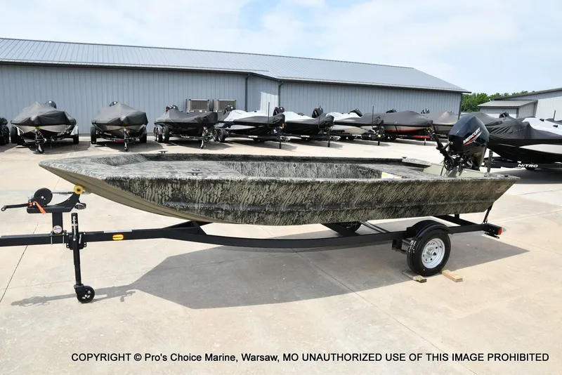 Slide: The Image of 2026 Tracker Grizzly 1648 Jon boat on trailer outdoors. - 12