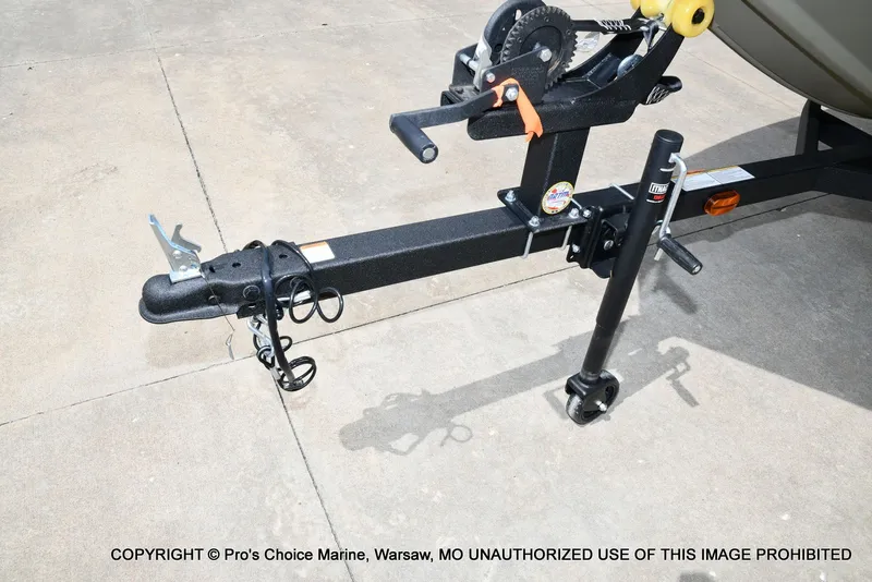 Slide: The Image of Trailer of Tracker Grizzly 1648 Jon 2026 on concrete surface. - 14