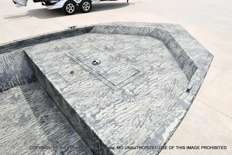 Slide: The Image of 2026 Tracker Grizzly 1648 Jon boat with camouflage pattern design. - 21