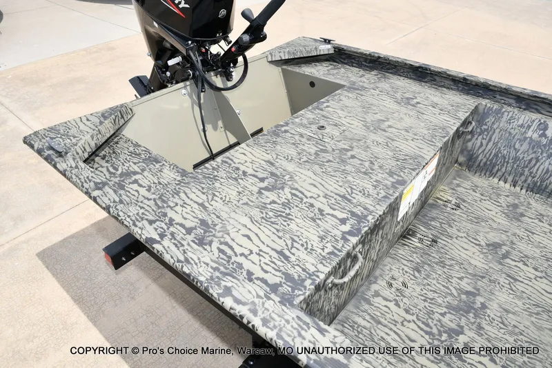 Slide: The Image of 2026 Tracker Grizzly 1648 Jon boat with camouflage design. - 22