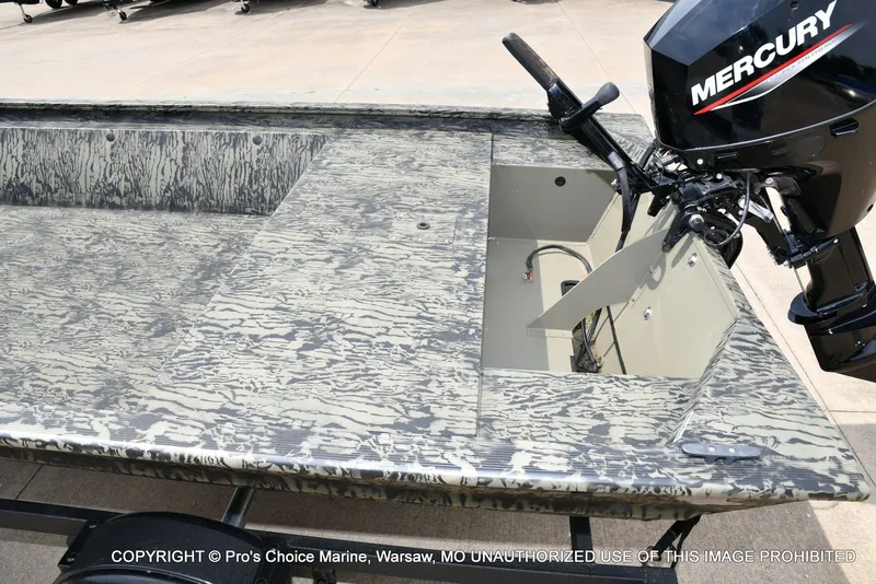 Slide: The Image of Tracker Grizzly 1648 Jon 2026 with Mercury engine, close-up view. - 26