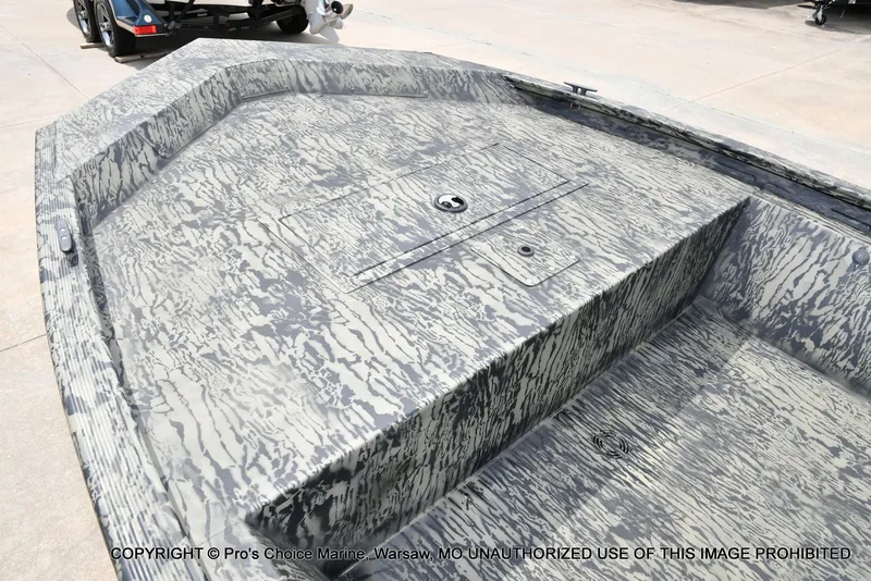 Slide: The Image of 2026 Tracker Grizzly 1648 Jon boat with camouflage pattern design. - 28
