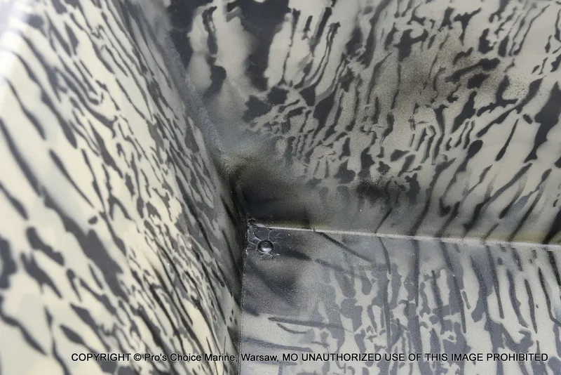 Slide: The Image of Interior view of Tracker Grizzly 1648 Jon 2026 with camouflage pattern. - 30