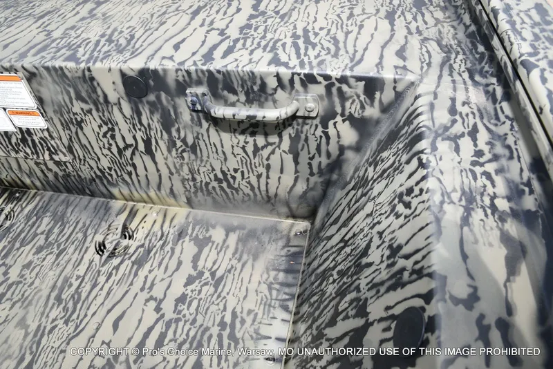 Slide: The Image of Tracker Grizzly 1648 Jon 2026 with camouflage pattern design. - 33