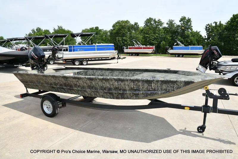 Slide: The Image of 2026 Tracker Grizzly 1648 Jon boat on trailer outdoors. - 39