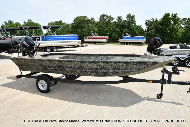 Slide: The Image of 2026 Tracker Grizzly 1648 Jon boat on trailer outdoors. - 40