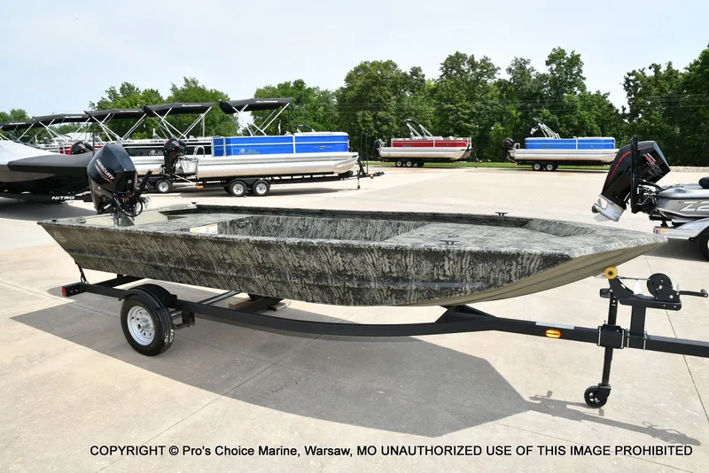 Slide: The Image of 2026 Tracker Grizzly 1648 Jon boat on trailer outdoors. - 41