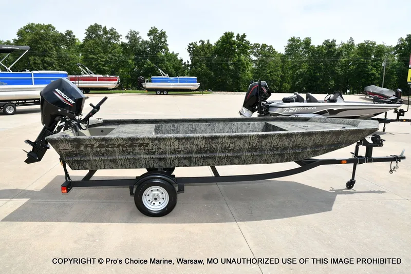 Slide: The Image of 2026 Tracker Grizzly 1648 Jon boat on trailer outdoors. - 6