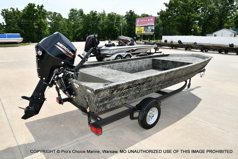 Slide: The Image of 2026 Tracker Grizzly 1648 Jon boat with Mercury engine on trailer. - 7