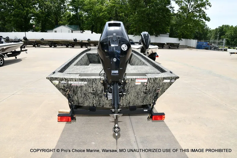Slide: The Image of 2026 Tracker Grizzly 1648 Jon boat on trailer outdoors. - 9