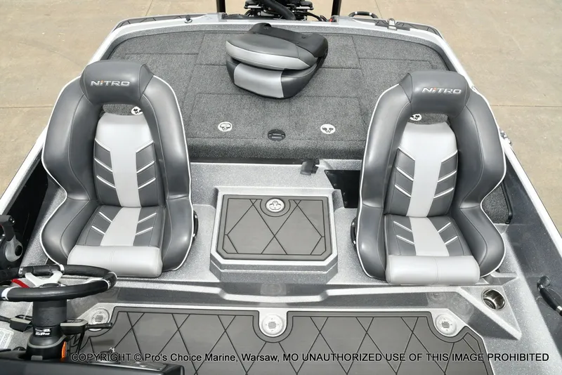 Slide: The Image of Interior view of 2024 Nitro Z21 XL Pro boat with gray seats. - 14
