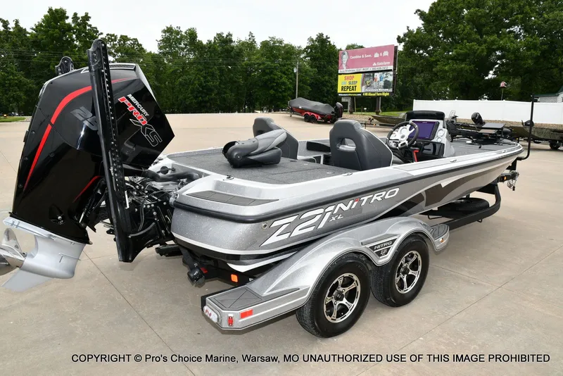 Slide: The Image of 2024 Nitro Z21 XL Pro boat on trailer, side view. - 19