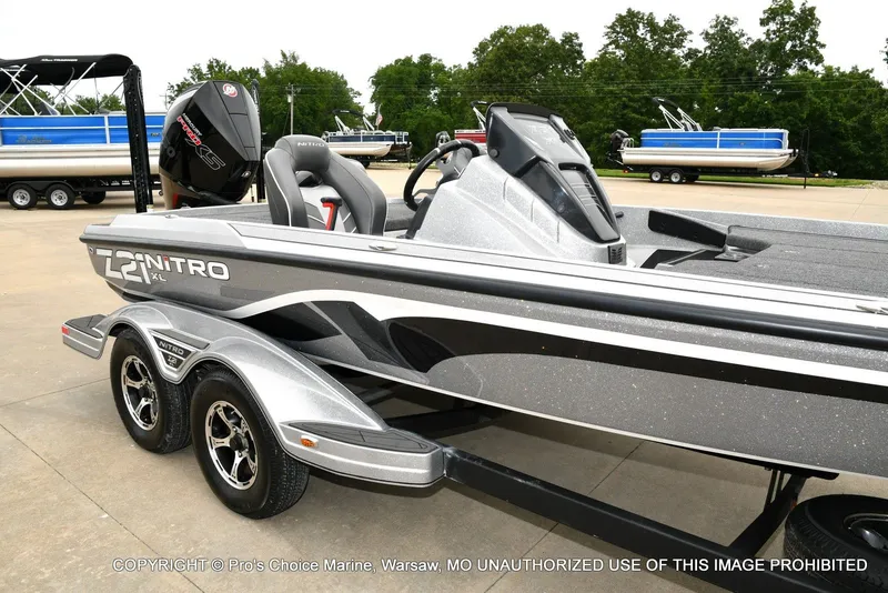 Slide: The Image of 2024 Nitro Z21 XL Pro boat on trailer, side view. - 2