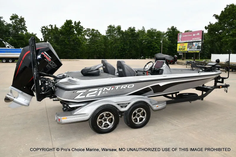 Slide: The Image of 2024 Nitro Z21 XL Pro boat on trailer, side view. - 20