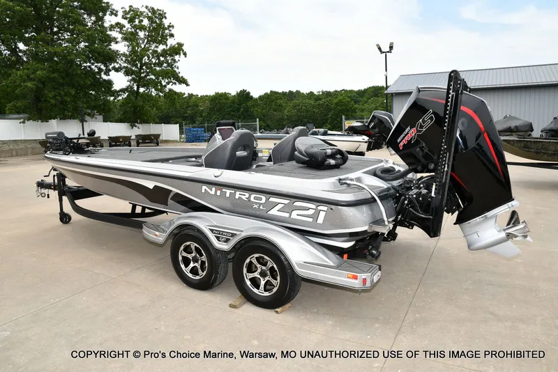 Slide: The Image of 2024 Nitro Z21 XL Pro boat on trailer, exterior view. - 26