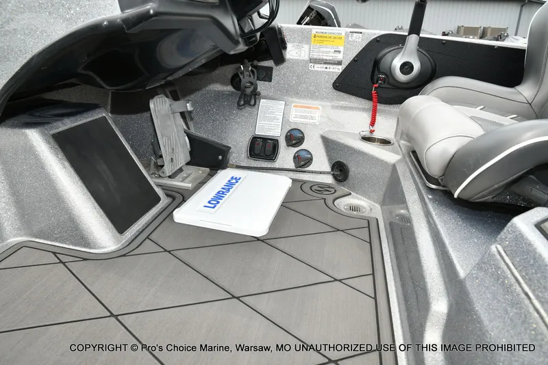 Slide: The Image of Interior of 2024 Nitro Z21 XL Pro with Lowrance equipment. - 48