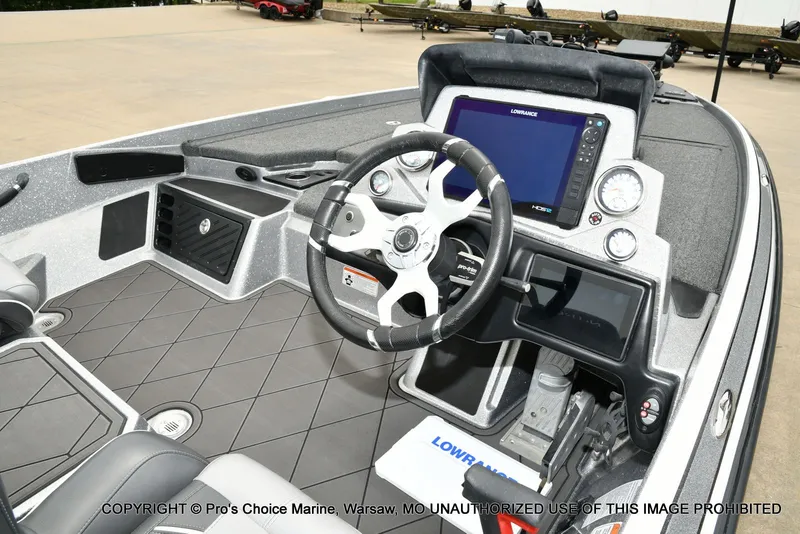Slide: The Image of Interior of 2024 Nitro Z21 XL Pro boat with modern control console. - 6