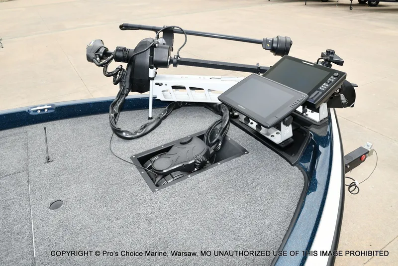 Slide: The Image of Ranger 522vx boat with modern electronics and controls, year 2002. - 3