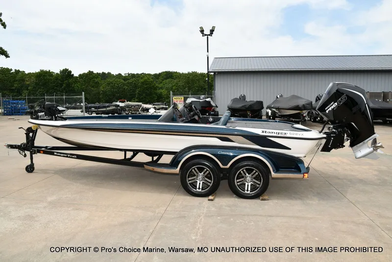 Slide: The Image of 2002 Ranger 522vx boat with 250HP Pro-XS engine on trailer. - 36