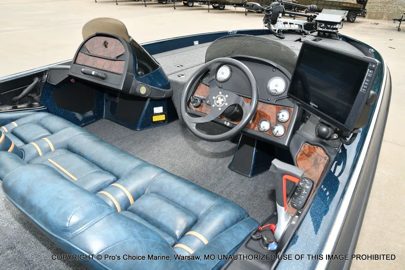 Slide: The Image of Interior view of 2002 Ranger 522vx boat with control console. - 7