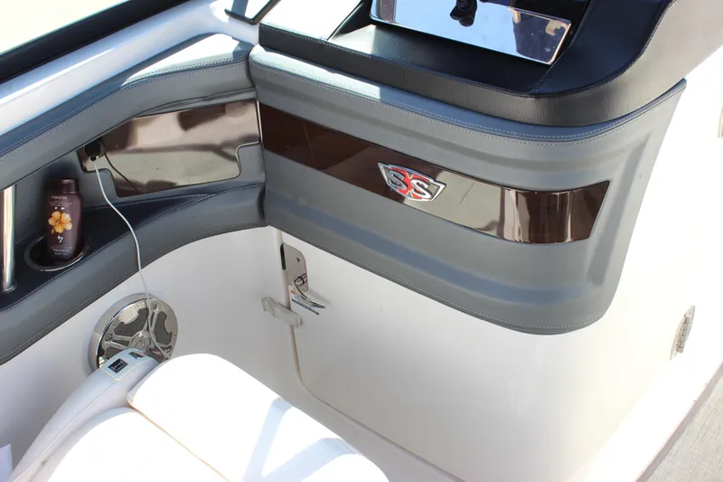 Slide: The Image of Interior of 2020 Chaparral 277 SSX boat with sleek design and modern features. - 16