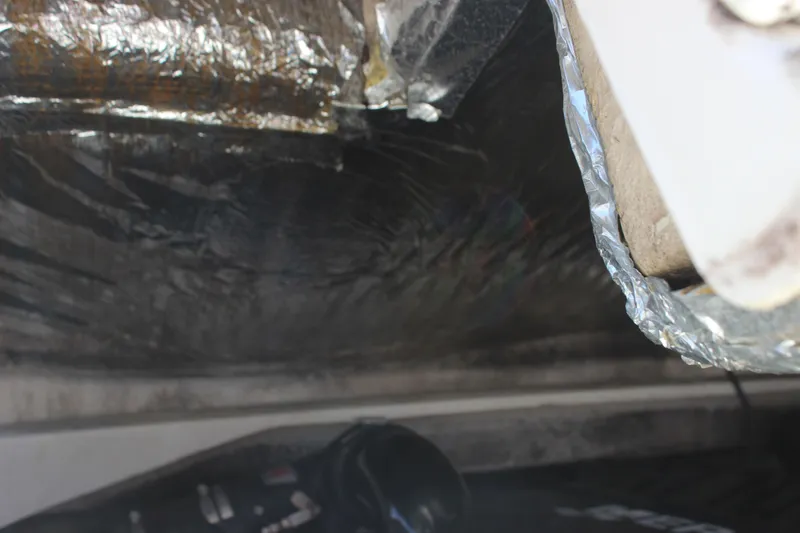 Slide: The Image of Engine compartment of a 2007 Sea Ray 270 Sundeck with reflective insulation. - 14