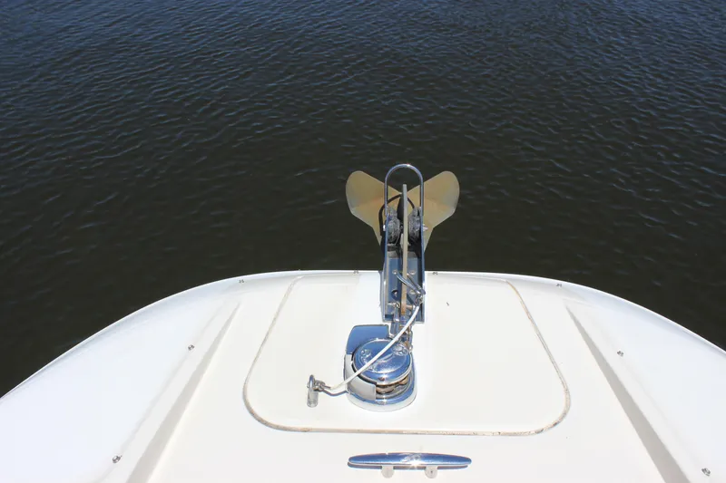 Slide: The Image of Bow view of 2007 Sea Ray 270 Sundeck with anchor over calm water. - 6