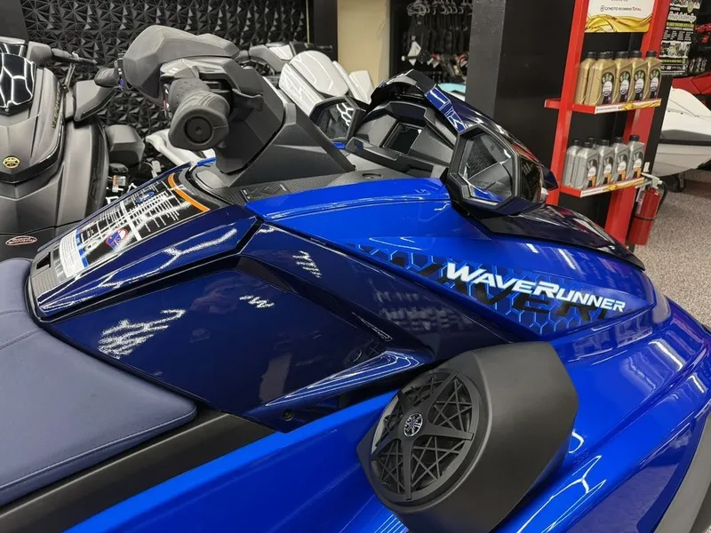 Slide: The Image of 2026 Yamaha WaveRunners VX1050AC in blue, close-up in showroom. - 10