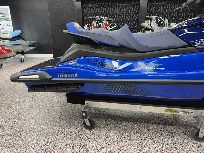 Slide: The Image of 2026 Yamaha WaveRunners VX1050AC in blue, side view in showroom. - 7