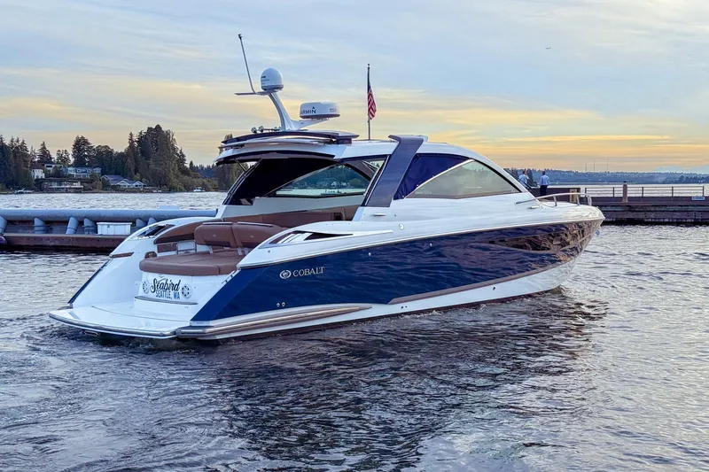 The Image of 2017 Cobalt A40 Coupe luxury boat docked at sunset, Seattle waterfront. - 0