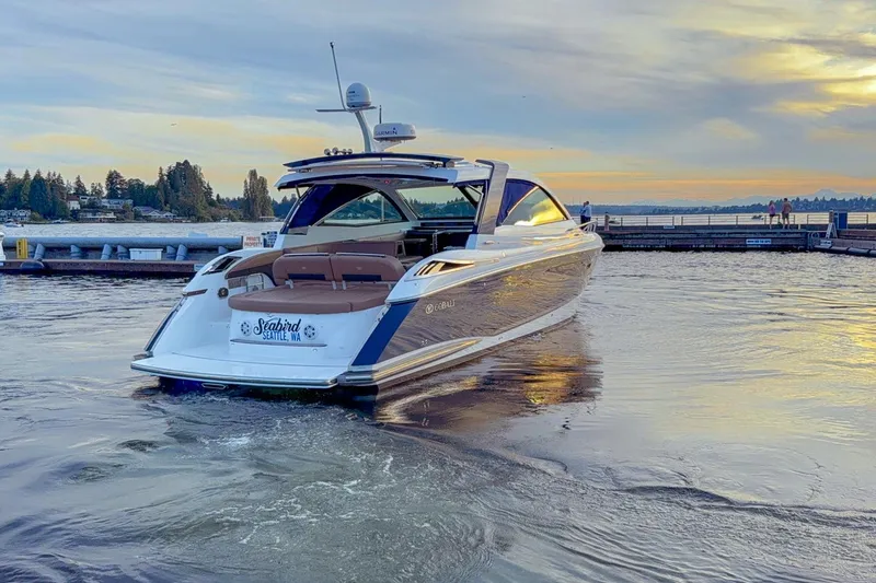 Slide: The Image of 2017 Cobalt A40 Coupe yacht docked at sunset, Seattle waterfront. - 27