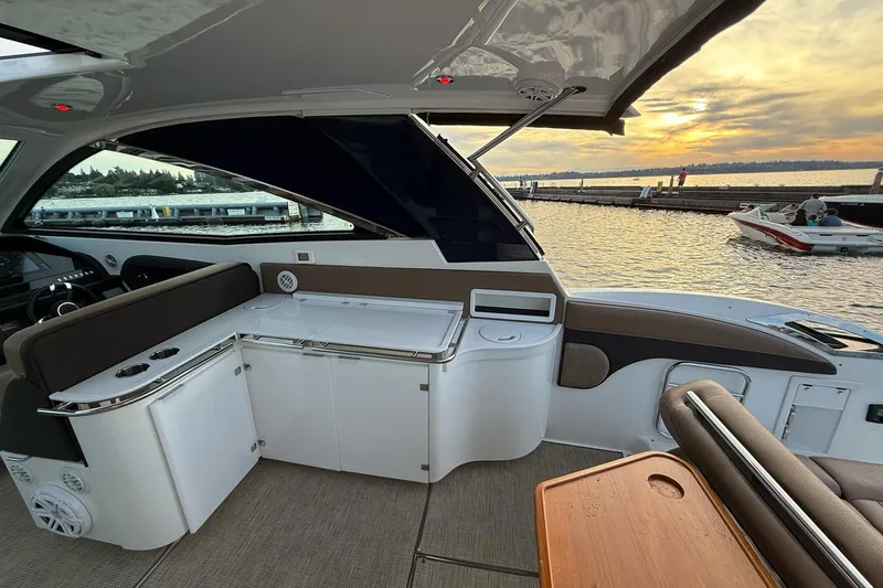 Slide: The Image of 2017 Cobalt A40 Coupe interior with sunset view over the water. - 30