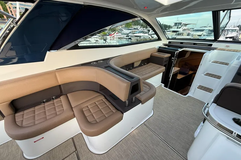 Slide: The Image of Luxurious interior of a 2017 Cobalt A40 Coupe yacht with elegant seating and modern design. - 32