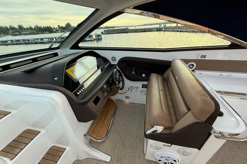Slide: The Image of Interior of 2017 Cobalt A40 Coupe boat with modern dashboard and leather seating. - 35