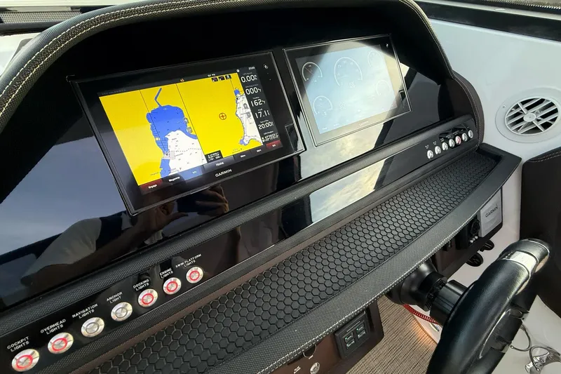Slide: The Image of Dashboard of a 2017 Cobalt A40 Coupe featuring Garmin navigation displays and control buttons. - 37