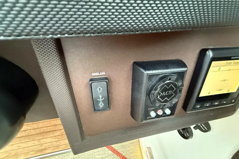 Slide: The Image of Control panel of a 2017 Cobalt A40 Coupe boat with windlass switch. - 41