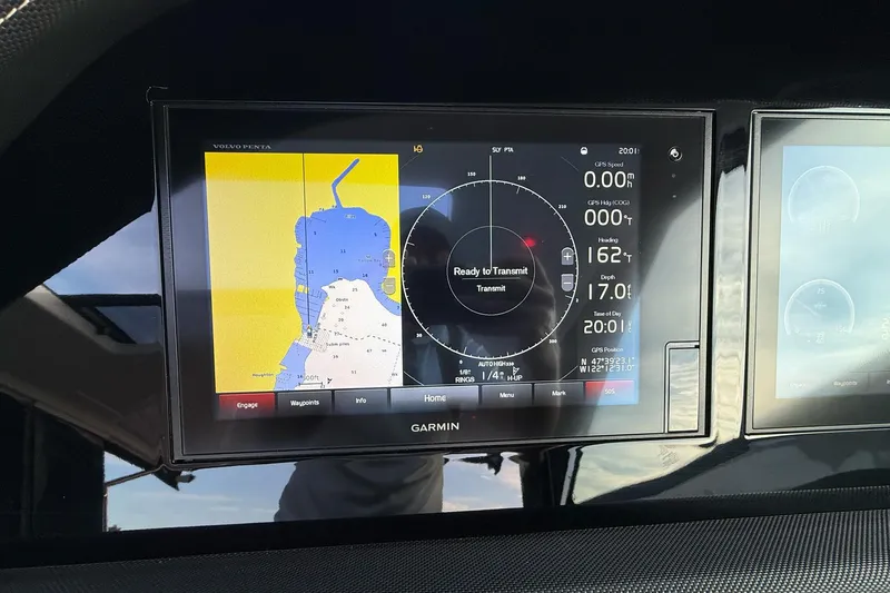 Slide: The Image of Garmin navigation display in 2017 Cobalt A40 Coupe, showing map and GPS data. - 42