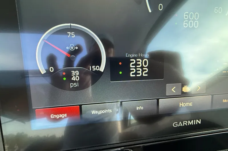 Slide: The Image of Dashboard display of a 2017 Cobalt A40 Coupe showing engine hours and pressure. - 44