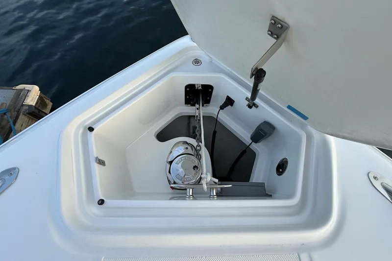 Slide: The Image of Anchor compartment of 2017 Cobalt A40 Coupe boat, featuring a secure anchor system. - 50