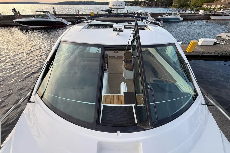 Slide: The Image of 2017 Cobalt A40 Coupe docked, showcasing sleek design and spacious interior. - 53