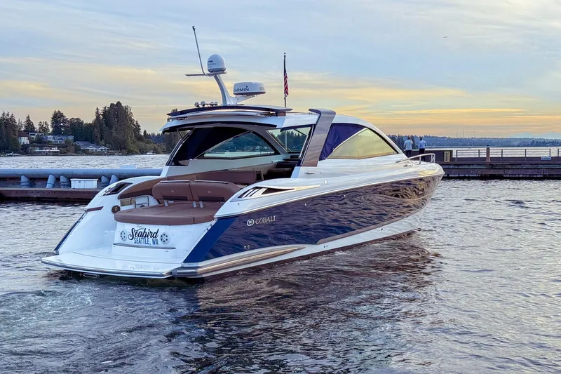 Slide: The Image of 2017 Cobalt A40 Coupe yacht docked at sunset, Seattle waterfront. - 9