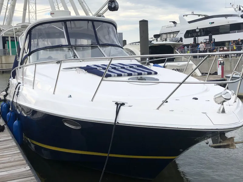 The Image of 2009 Regal Commodore 3760 IO yacht docked at marina. - 0