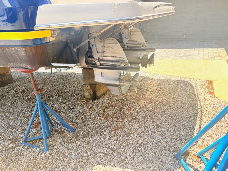 Slide: The Image of The image shows the drive of a 2009 Regal Commodore 3760 IO on a gravel surface. - 31