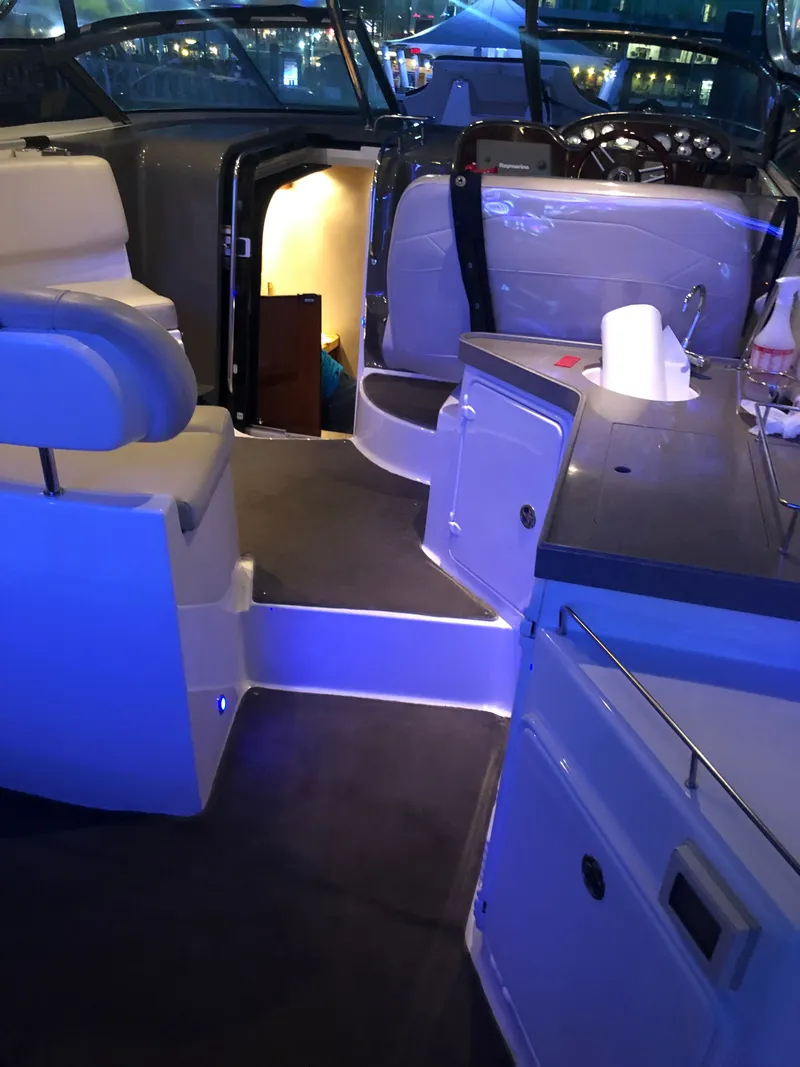 Slide: The Image of Interior of a 2009 Regal Commodore 3760 IO yacht at night. - 5